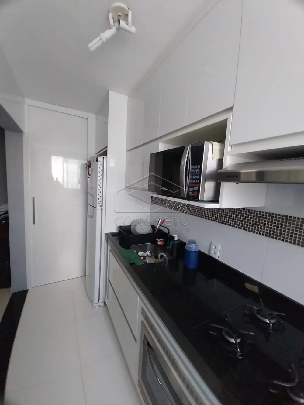 Apartamento Duplex - Sala, churrasqueira e cozinha – Foto de Motel